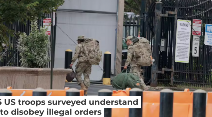 National Guard members arrive at the Guard’s headquarters at D.C. Armory on Aug. 12, 2025 in Washington. Anna Moneymaker/Getty Images